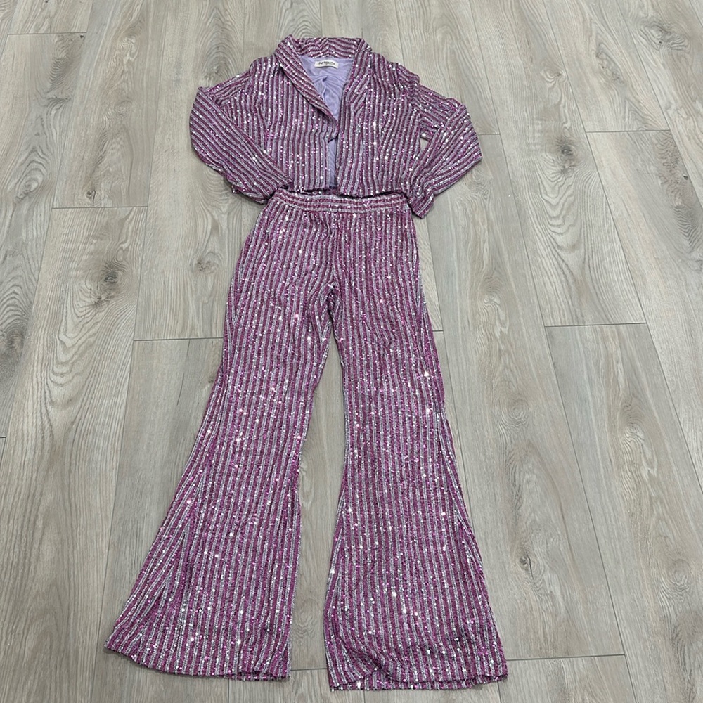 Brand new pink sequins matching set. Size small.